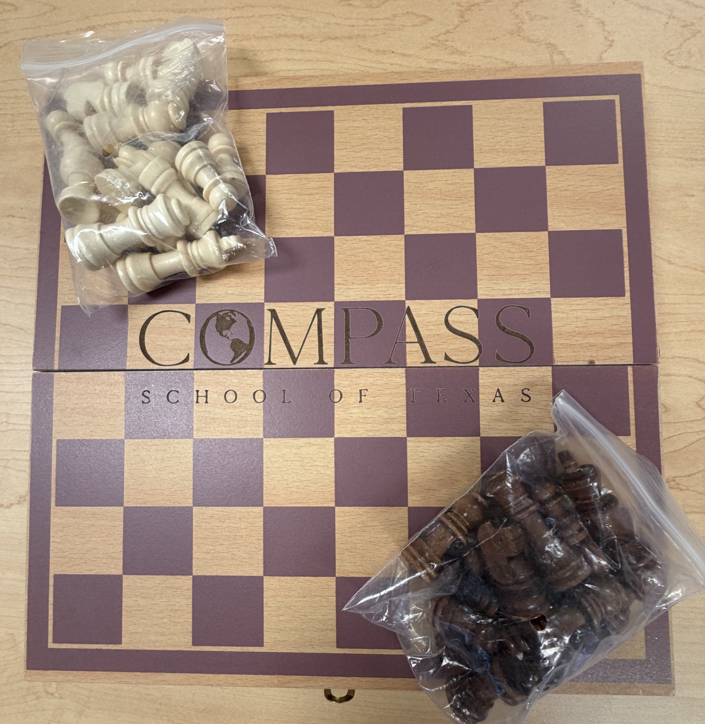 Chessboard with Compass Logo
